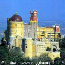 Pena Palace in Sintra, yellow and red walls, domes among the trees