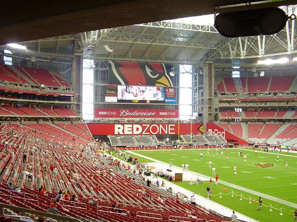 Inside State Farm Stadium in Glendale with players training on the field