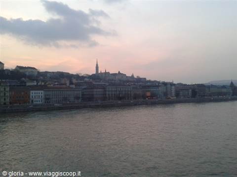 Budapest: the Danube river in front of Buda hill and Matthias Church at dawn