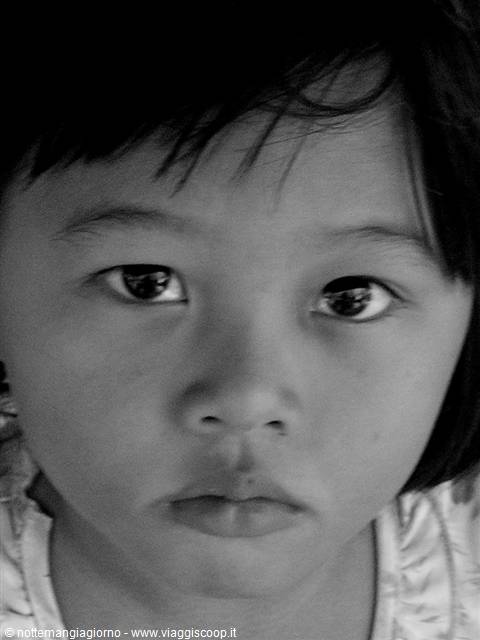 Black and white portrait of a girl looking into the camera