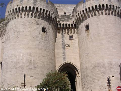 Medieval stone towers of the Papal Palace, Avignon, under bright sun
