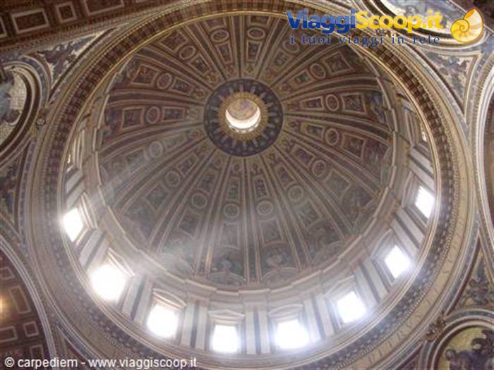St. Peter's Basilica dome in the Vatican, golden mosaics lit by windows
