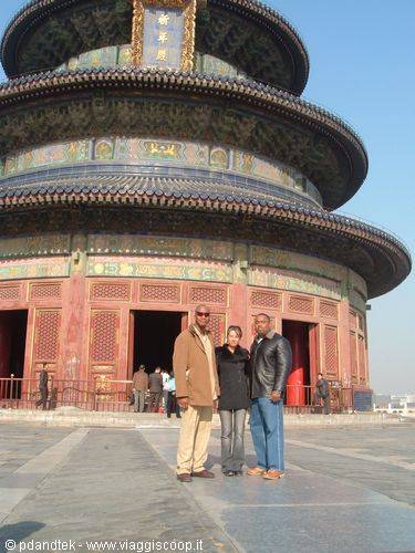 Tourists pose in front of the Hall of Prayer for Good Harvests, Temple of Heaven, Beijing
