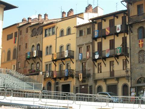 Medieval houses with heraldic coats of arms on balconies, Piazza Grande, Arezzo