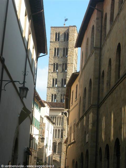 The bell tower of Santa Maria della Pieve rises between Arezzo's old houses