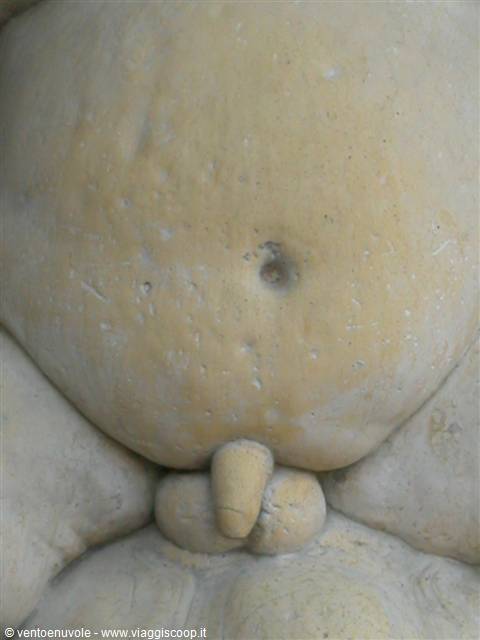 Carved stone belly and genitals of a statue
