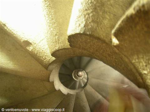 Stone spiral staircase, natural light from above