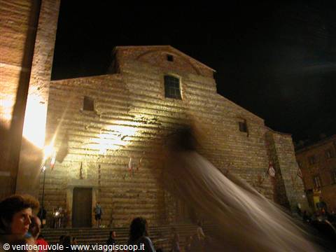 Illuminated stone facade of Perugia cathedral San Lorenzo at night