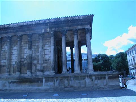 Ancient Roman stone temple with Corinthian columns, the Maison Carrée in Nîmes