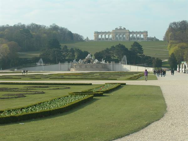 Schönbrunn gardens with the Gloriette on the hill and Neptune fountain