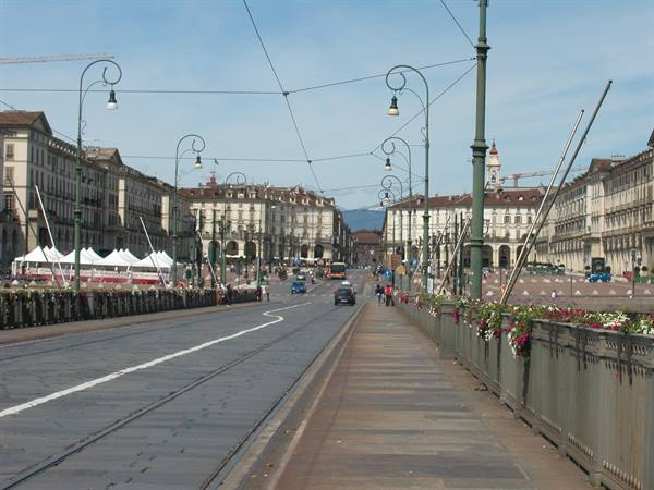 Piazza Vittorio Veneto in Turin seen from the bridge, tram tracks and flowers