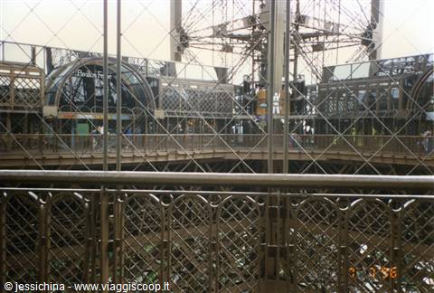 Wrought iron railing on the Eiffel Tower with metal framework and lattice balcony