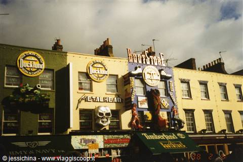 Record and souvenir shops with giant signs in Camden Town, London