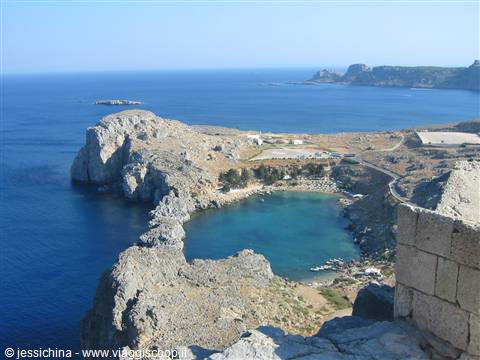 St Paul's Bay in Lindos, turquoise water between rocks and ancient walls