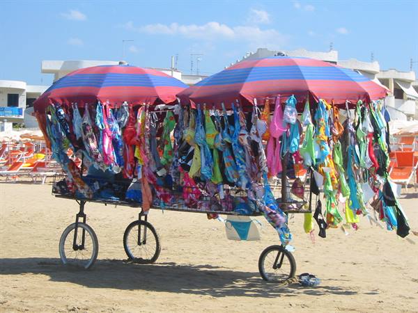 swimsuit sellers on the beach