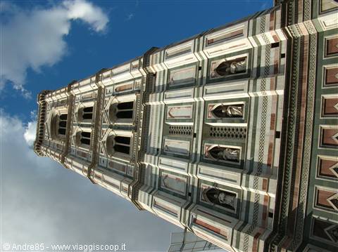 Giotto's Bell Tower in Florence, white green and pink marble against the sky