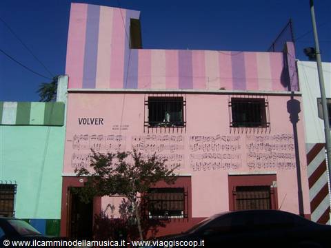 Pink striped facade painted with musical scores, Caminito, La Boca