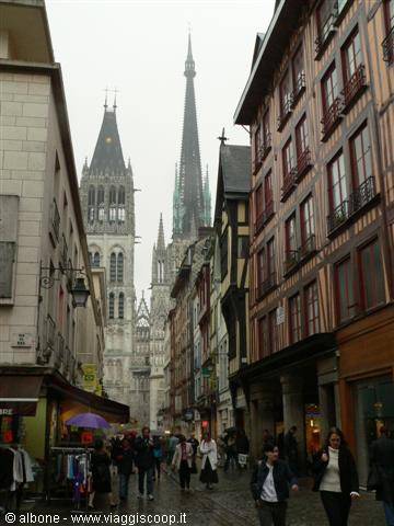 Pedestrian street with timbered houses toward Rouen Cathedral
