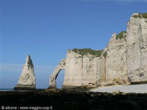 White chalk cliff with natural arch and sea stack, Étretat