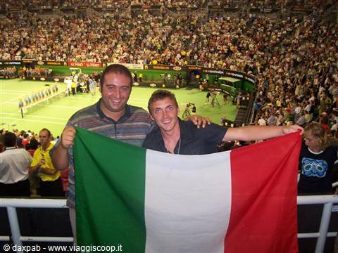 Two fans wave the Italian flag at the Australian Open in Melbourne
