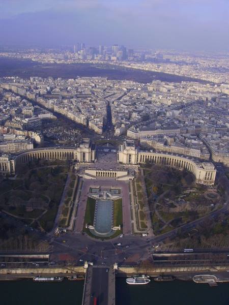 Aerial view from the Trocadéro in Paris with fountains, Seine and La Défense skyline