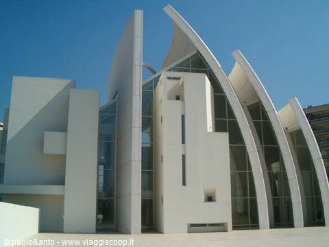 Dives in Misericordia church, white concrete sails and glass facade