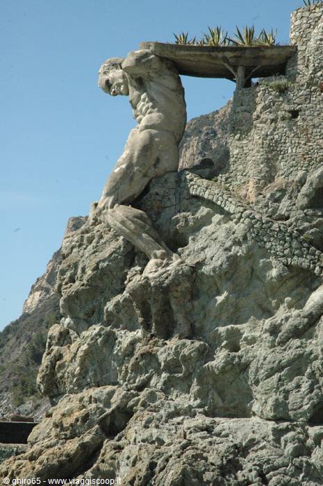 The Giant of Monterosso, concrete statue holding the terrace on the rocky shore