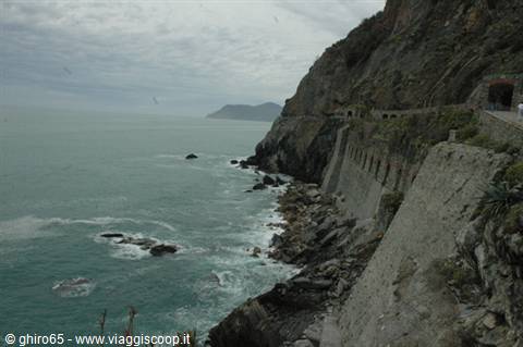 Via dell'Amore in Cinque Terre, cliffside path carved above the turquoise sea