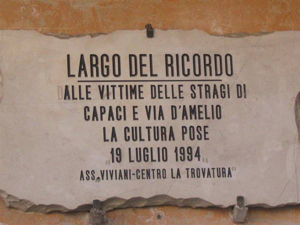 Marble plaque on ochre wall: Largo del Ricordo, victims of Capaci and Via D'Amelio bombings