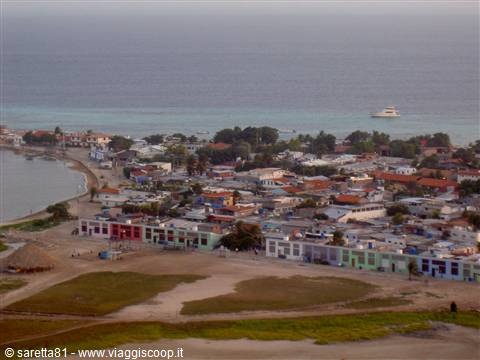 Gran Roque, Los Roques: colorful beachfront houses, turquoise sea and a yacht