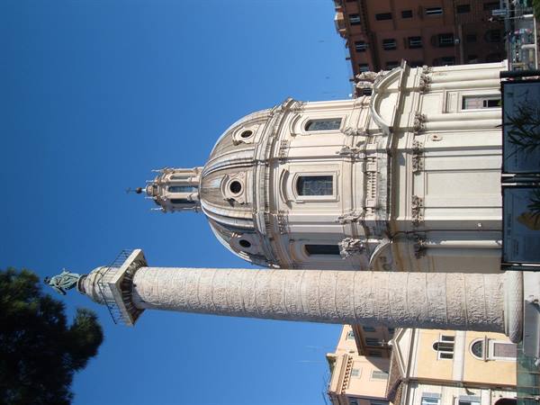 Trajan's marble column before the baroque dome, Rome, daylight