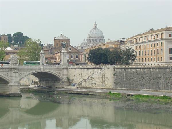 Ponte Vittorio Emanuele II over the Tiber with St Peter's dome in Rome