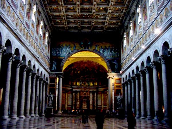 Nave of St. Paul Outside the Walls: marble columns, golden mosaics, visitors below