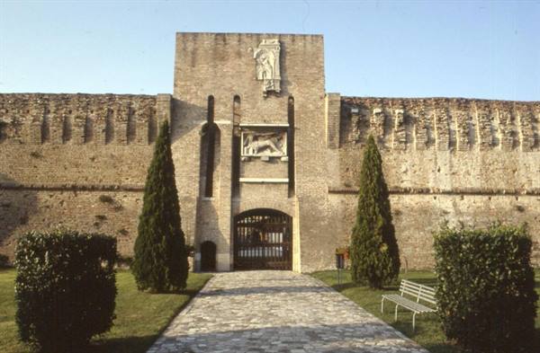 Brick gate with marble reliefs at the Rocca Malatestiana in Cesena