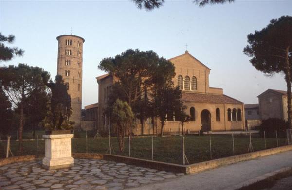 Statue of Saint Apollinaris before the old brick basilica in Classe, Ravenna