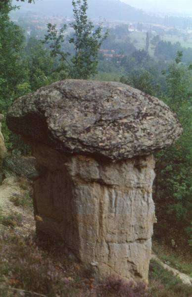 Balancing mushroom-shaped boulder of Ciciu del Villar atop rocky pedestal
