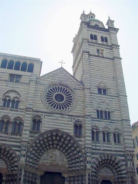 San Lorenzo Cathedral in Genoa, striped marble facade, rose window and bell tower