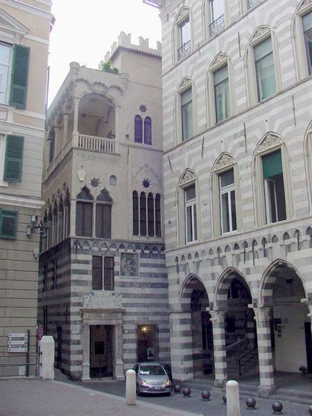 Medieval marble palaces with striped stone and arched loggias, Genoa