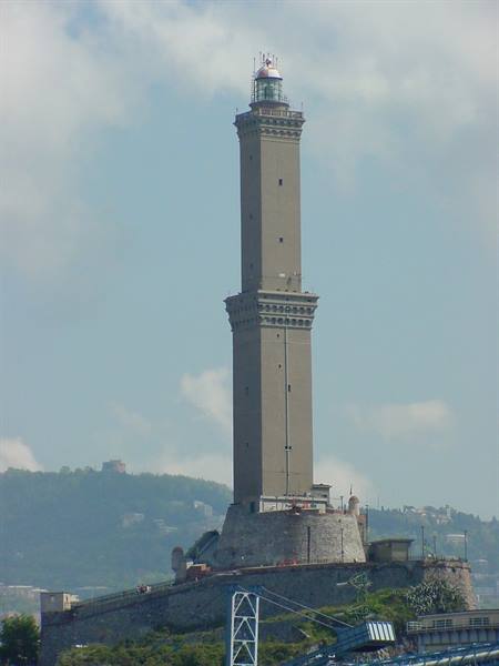 Genoa's Lanterna, ancient stone lighthouse, towering above the hill