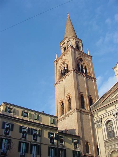 Brick bell tower of Saint Anthony Basilica in Padua against blue sky