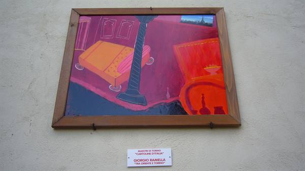 Painting by Giorgio Ramella in wooden frame, hung on a light wall