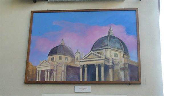 Framed painting of two domes against a pink and blue sky