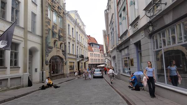 Cobblestone street lined with old facades, Tallinn