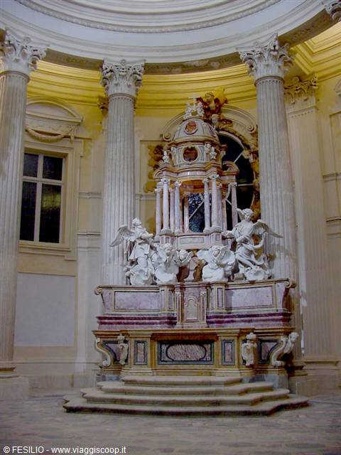 Baroque marble altar with carved angels among Corinthian columns