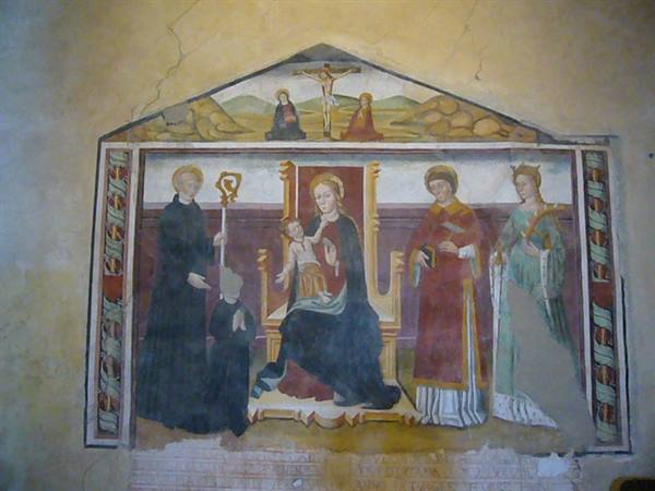 Fifteenth-century fresco of Madonna and Child enthroned with saints, crucifix above