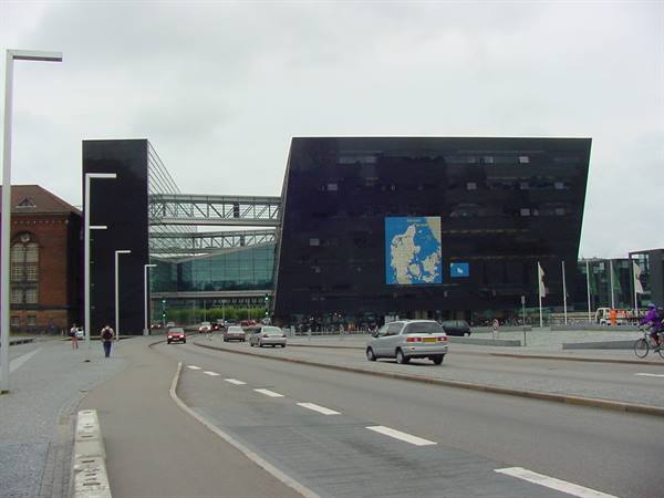 The Black Diamond, Royal Library in Copenhagen, with cars passing by