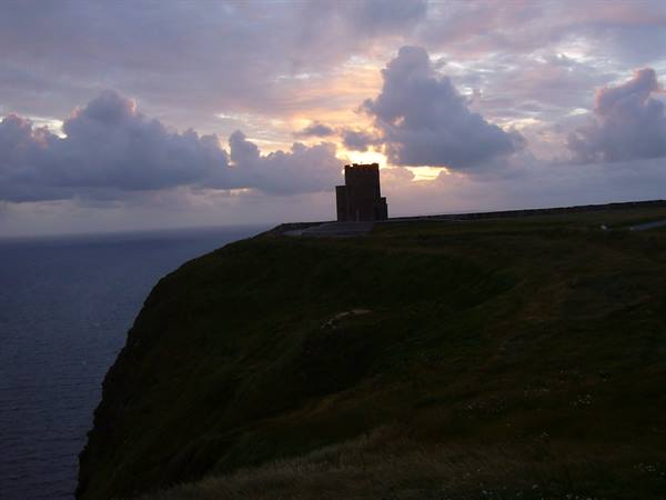 O'Brien's Tower on the Cliffs of Moher, sunset clouds over the ocean