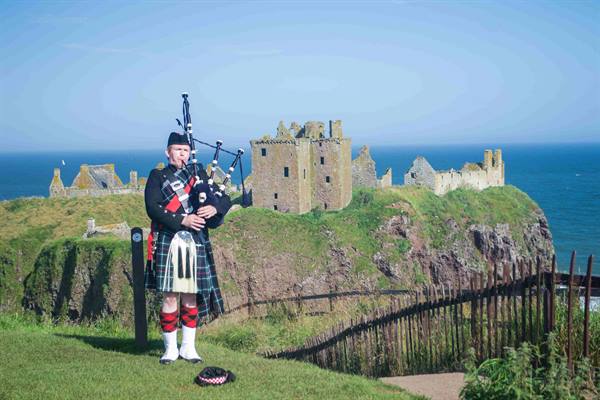 Dunnottar Castle with a typical inhabitant