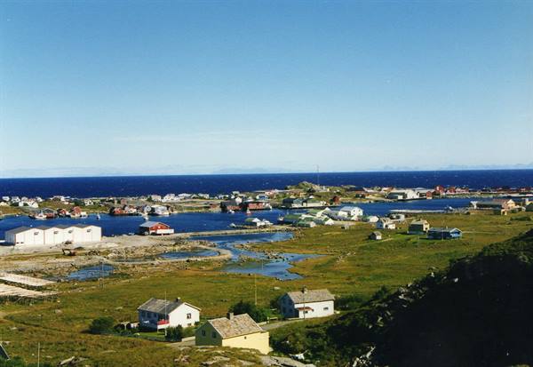 Fishing village with colorful houses and boats along the Nordic coast