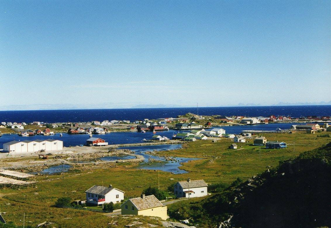 Fishing village with colorful houses and boats along the Nordic coast